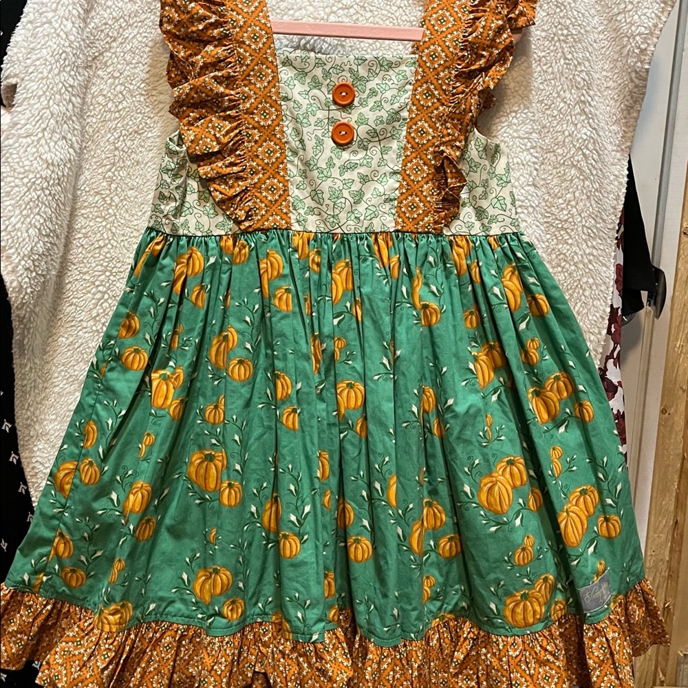 Affordable girls boutique Eleanor Rose dresses . Perfect for fall.  Have 2